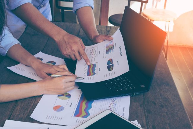 Business,People,Brainstorming,At,Office,Desk,,They,Are,Analyzing,Financial