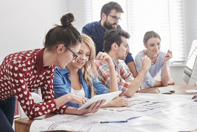 Young,Team,Of,Architects,Working,On,A,New,Project