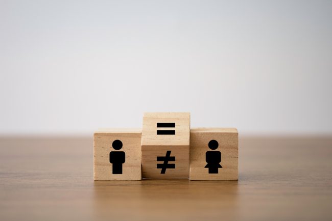 Flipping,Of,Unequal,To,Equal,Sign,Between,Man,And,Woman.