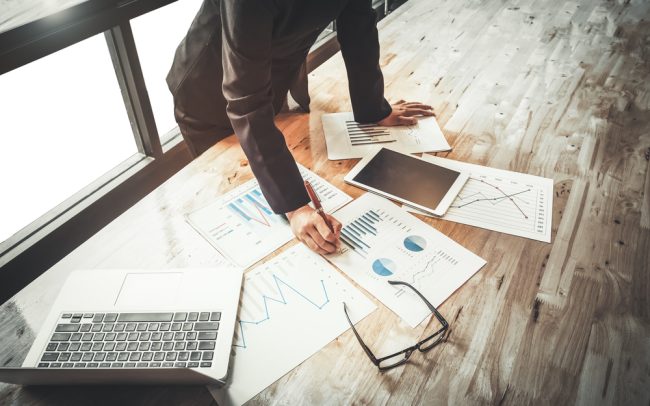 Woman,Investment,Consultant,Analyzing,Company,Annual,Financial,Report,Balance,Sheet
